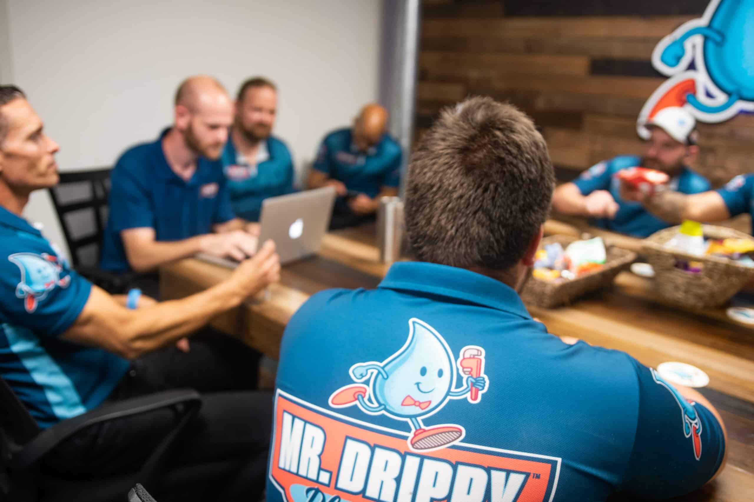 Mr Drippy Plumbing Team Meeting